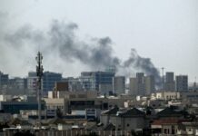 Drone debris injures 6 in Abu Dhabi, missiles target Qatar